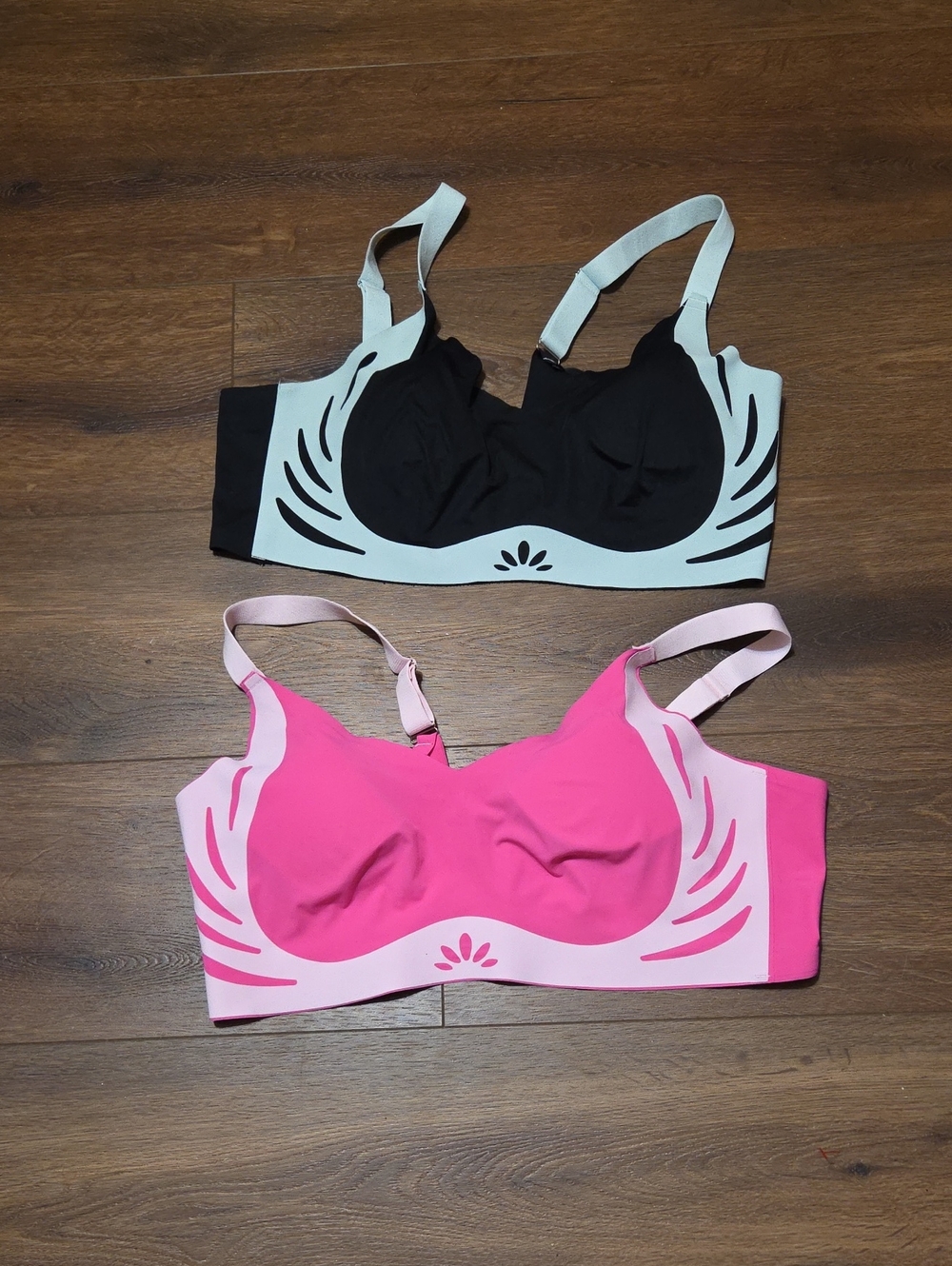 2 no brand name pink sports bra size 5X and blue/black sports bra size 5X